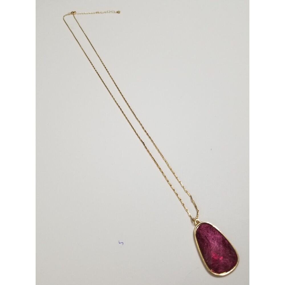 Thirtytwo inch goldtone necklace with three " extension large red pendant n251